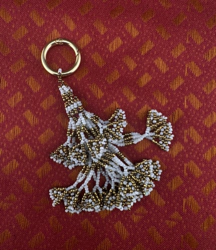 دلّاية كوتشي صغيرة بالخرز الذهبي Kuchi Golden Bead...