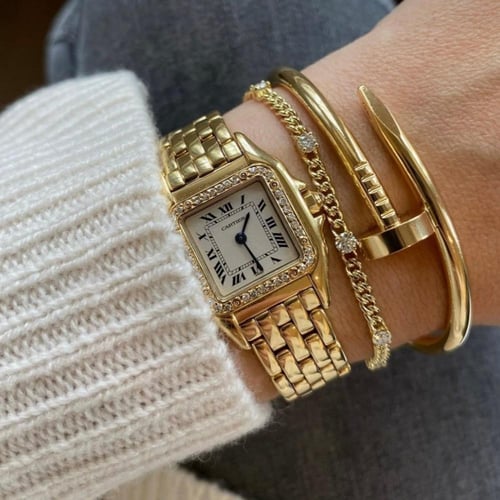 ساعة Basic ذهبي