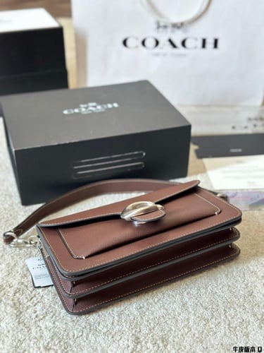 تابي كوتش البني