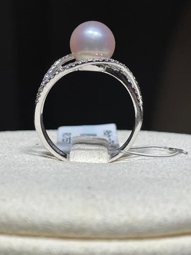 خاتم لؤلؤ وألماس بتصميم متقاطع فاخر