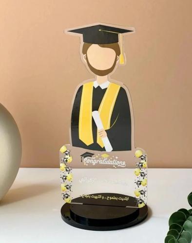 A luxurious graduation shield with a design of the...