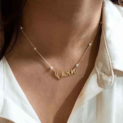 قلادة ذهب اسمين شكل قلب