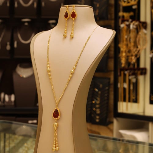 طقم ذهب سبحة حجر عقيق كبدي