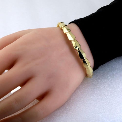 سوارة واقفة لون ذهبي