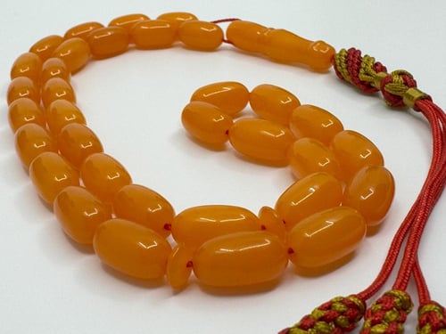 سبح تراب الكهرمان