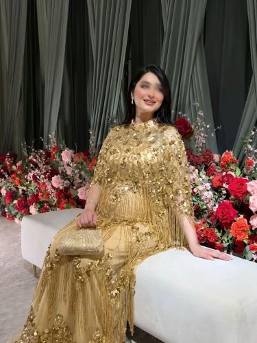 فستان شهد الملكي الذهبي بشرّابات وكاب فاخر