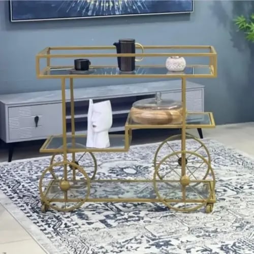 عربة تقديم ذهبية شكل سيكل وسطح زجاج شفاف - بتصميم...