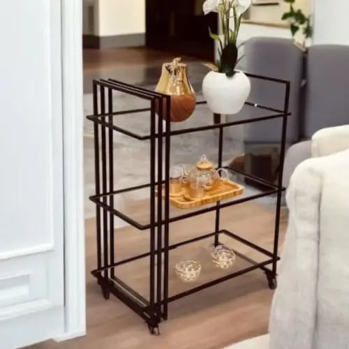 عربة تقديم بقاعدة حديد باللون البني وسطح زجاج شفاف