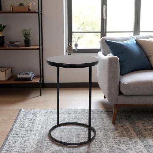 طاولة خدمة لون أسود شكل دائري قاعدة حديد وسطح خشب...