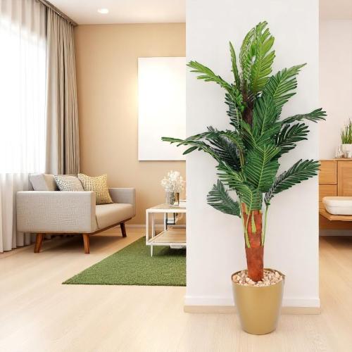 شجر صناعي بمركن لون ذهبي