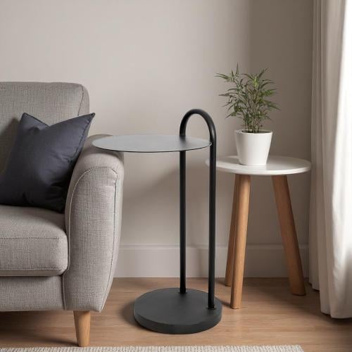 طاولة خدمة حديد شكل دائري لون أسود وسطح حديد لون أ...