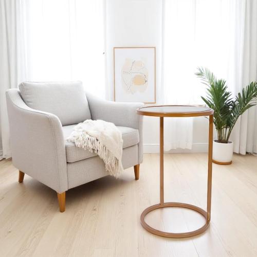 طاولة خدمة شكل دائري لون ذهبي وسطح زجاج لون بني