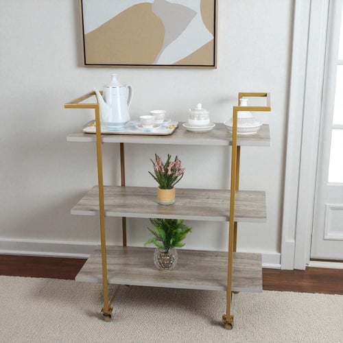 عربة تقديم قواعد لون ذهبي ثلاثة دور سطح لون خشبي