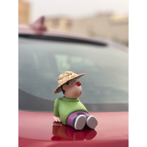زينة سيارة بشكل كرتوني