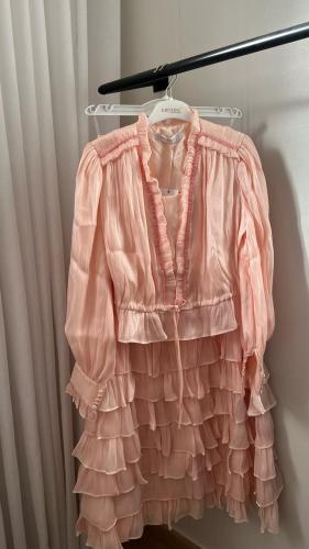 Apricot-colored trousers