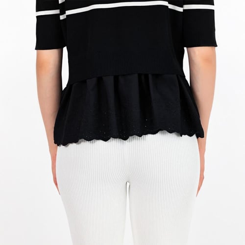 طقم بنطلون ابيض مع بلوزة سوداء