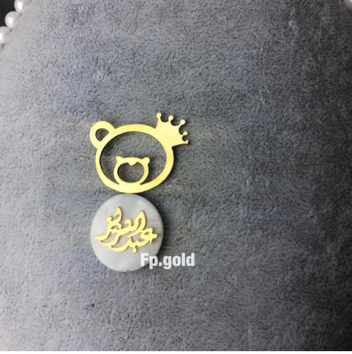 بروش صدف دبدوب وتاج مطلي ذهب