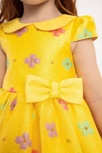 فستان مواليد اصفر مبهج + ربطه شعر