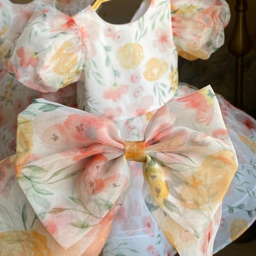 فستان اورقنزا منفوش بطبعات الورد