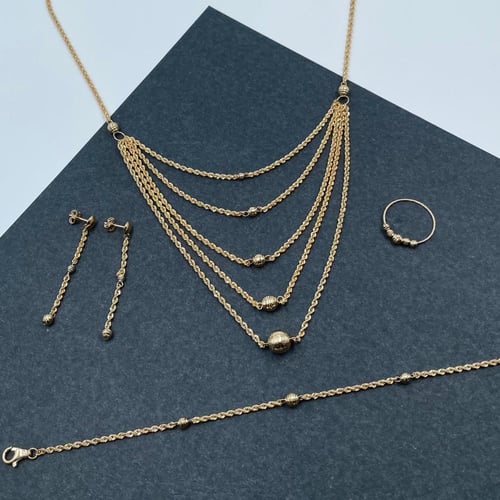 طقم ذهب أصفر عيار 18