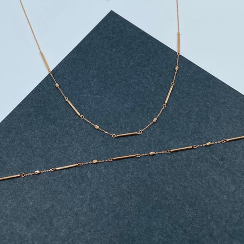 عقد + سوارة ذهب أصفر عيار 21