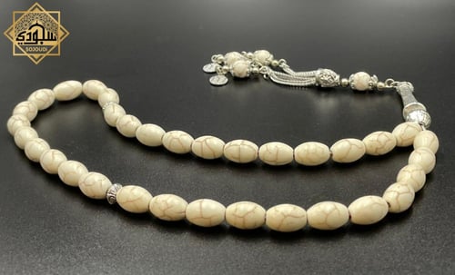 سبحة فيروز طبيعي أبيض (33 خرزة بيضاوي) مميزة
