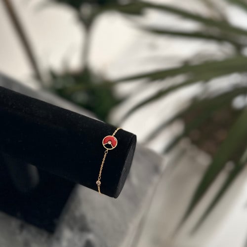 سوارة ذهبي احمر