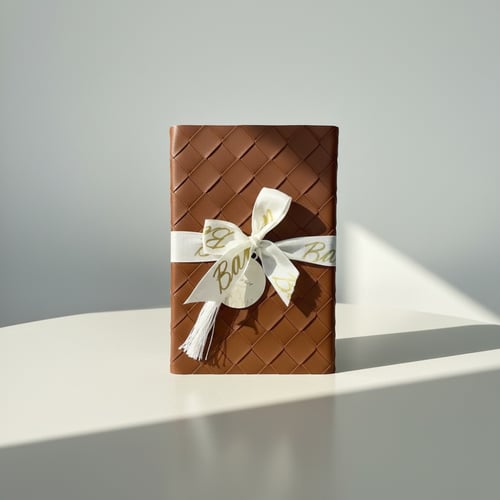 هدية مصحف مع تغليف جلد