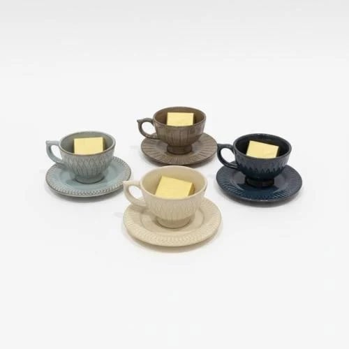 A gift cup with chocolate