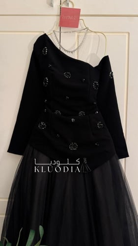 فستان ميد فخم تل