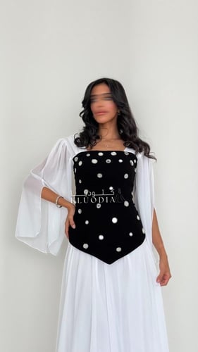 فستان انيق ساتر ب اكمام واسعه