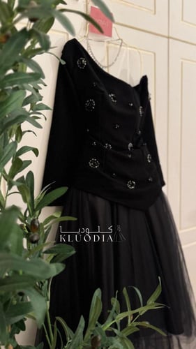 فستان ميد فخم تل