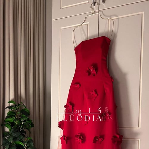 فستان احمر توب بتدخيلة ورود واكمام منفصله