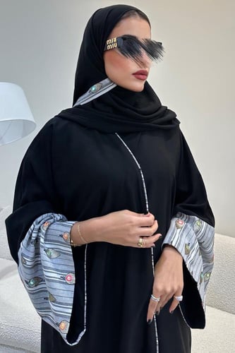 عبايه كريب كوري مزين باكمام مشجره القصه نص كلوش +...