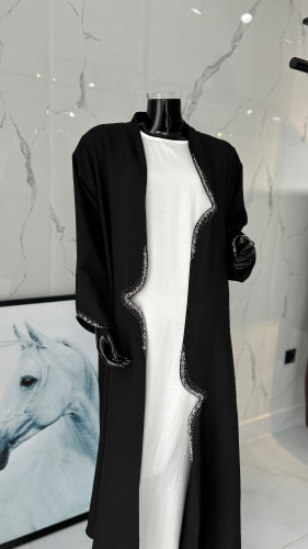 Filled with two pieces with white embroidery.