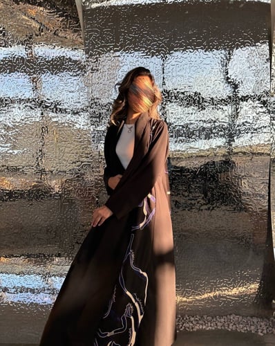 black X blue stitching