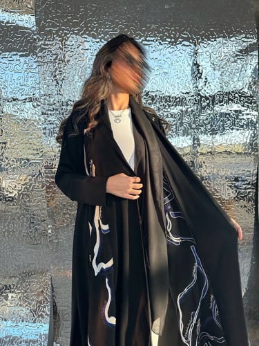 black X blue stitching