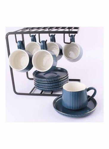 اكواب قهوة سيراميك بألوان هادئة مع أطباق وحامل تجف...