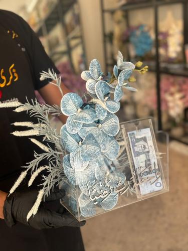 باق اكريلك مع الاوركيد وحامل المبلغ