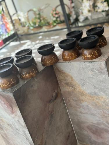 مبخرة خشبيه بكتابه اختياريه