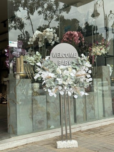 استاند مواليد بعباره من الخيط بنفس العباره