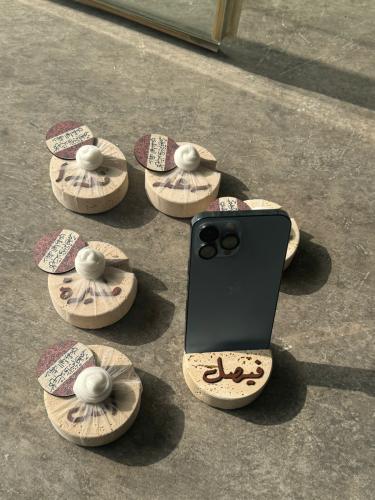 ستاند جوال بحجر الترافينتو