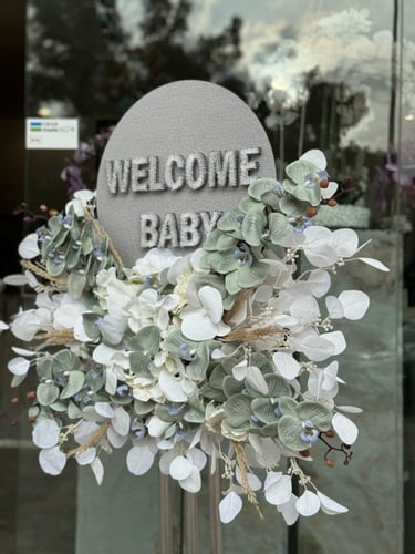 استاند مواليد بعباره من الخيط بنفس العباره