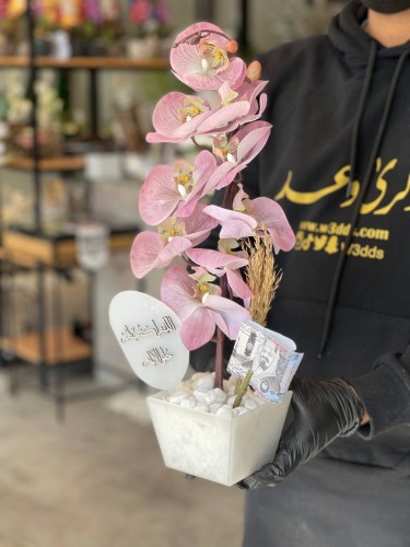 فازة الاكريلك مع الاوركيد الوردي
