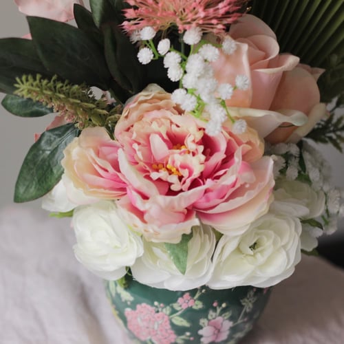 باقه ورد صناعي بمزهريه متوسطه الحجم