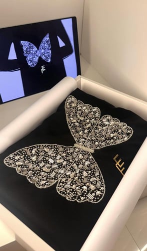 عباية الفراشة