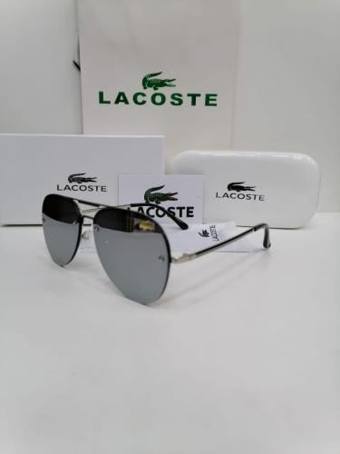 نظاراة لاكوست فضي اطار فضي