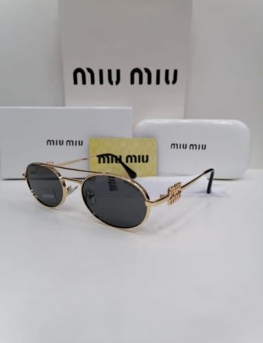 نظاراة Miu miu اسود اطار ذهيي