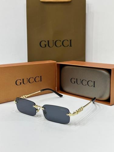 نظارة قوتشي اسود اطار ذهبي