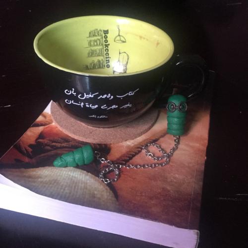 فاصل كتاب دودة الكتب